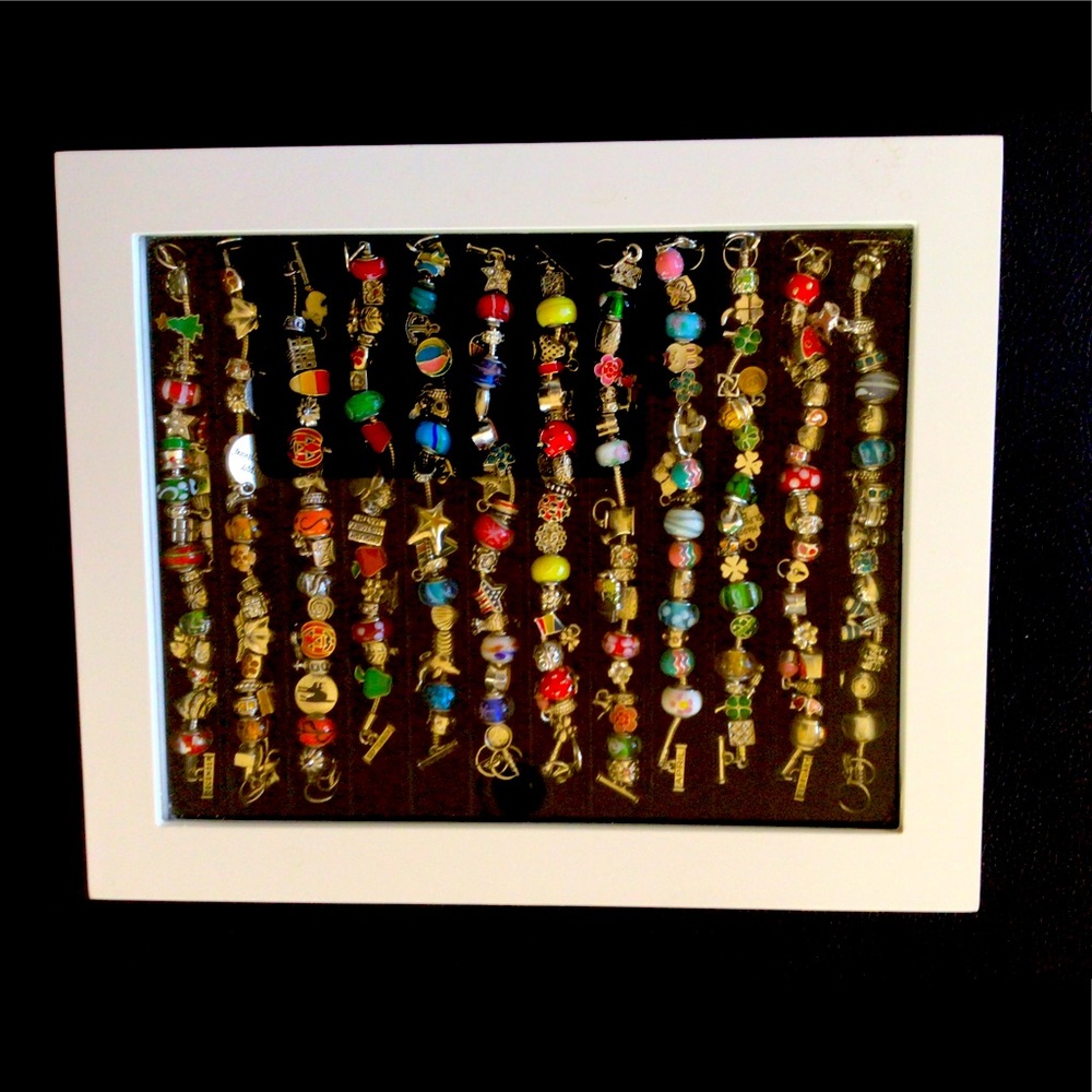 Monthly Themed Bracelets. 12 bracelets and display case included.